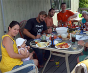 Four generations enjoying a lobster bake