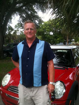 Terence Lernihan with red Mini Cooper