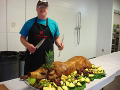 Terence prepares to cut pig